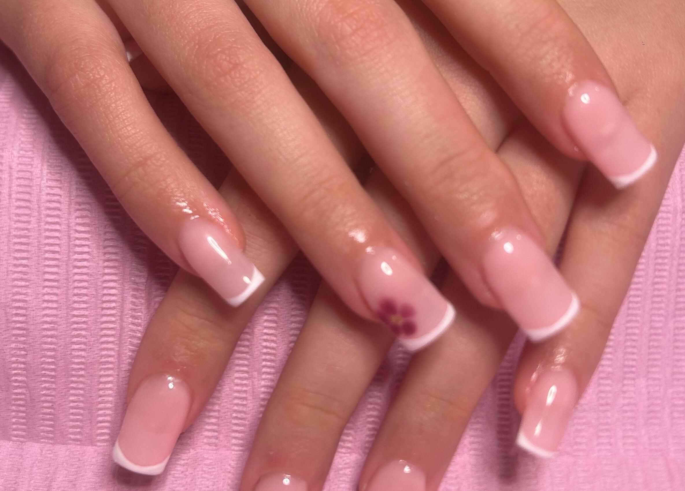 French manicure with floral accent at Popsiesmanis, Southampton, England, GB.