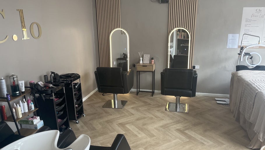 Chic interior of Leah Davies Hairdressing @ C.Lo Hair & Beauty, Hartlebury, England, GB with modern salon chairs.