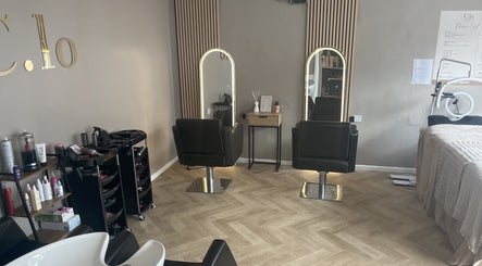 Chic interior of Leah Davies Hairdressing @ C.Lo Hair & Beauty, Hartlebury, England, GB with modern salon chairs.