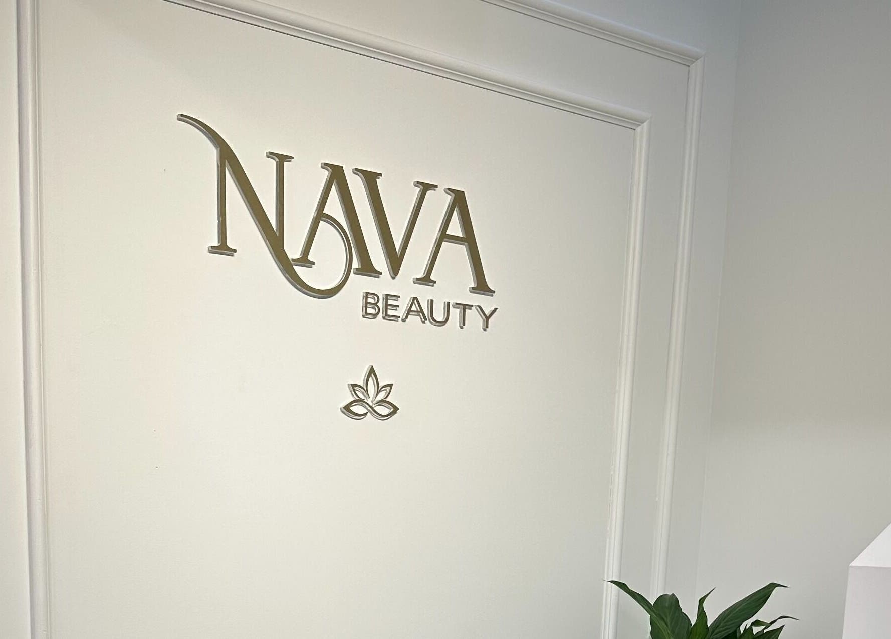Entrance of Nava Beauty Salon in Christchurch, Canterbury Region, NZ, showcasing elegant signage.