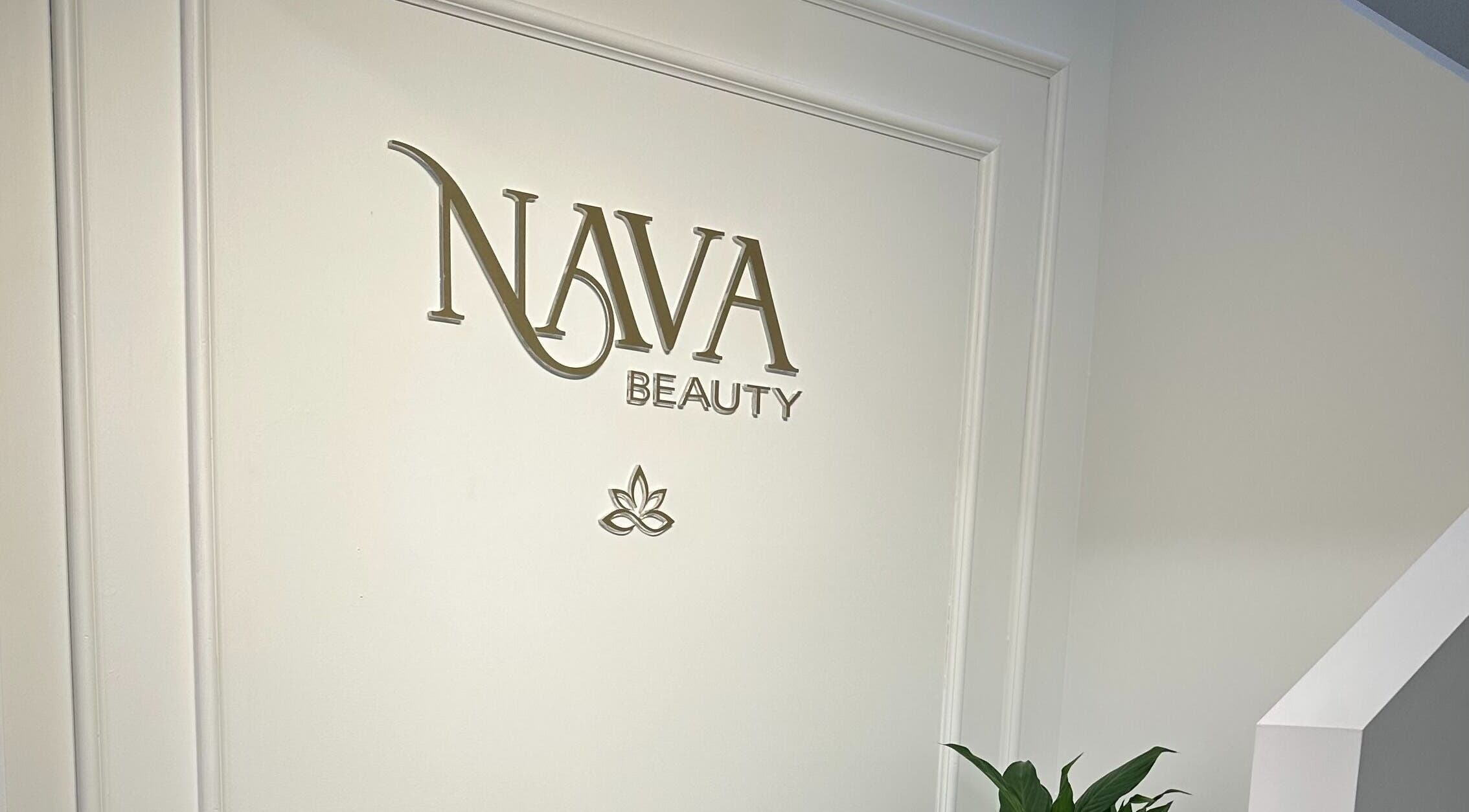 Entrance of Nava Beauty Salon in Christchurch, Canterbury Region, NZ, showcasing elegant signage.