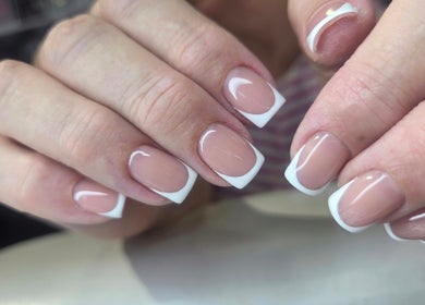 Close-up of elegant French manicure at Nails by Monika, Torremolinos, Malaga, ES.