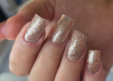 Sparkling gold glitter nails at Nails by Monika, Torremolinos, Malaga, ES.