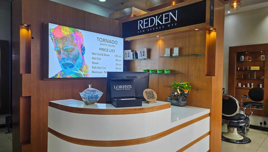 Reception at Tornado Gents Salon - Marina, Dubai, showcasing services, products, and sleek design.