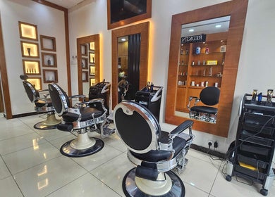 Modern barber chairs and sleek interior at Tornado Gents Salon - Marina, Dubai, Dubai, AE.