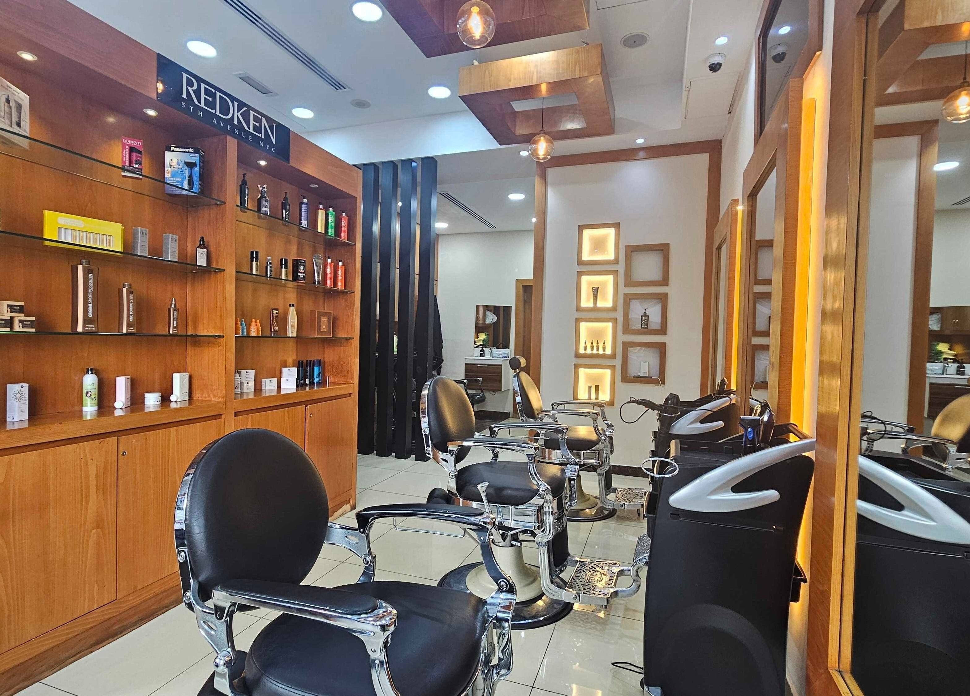 Interior of Tornado Gents Salon - Marina in Dubai, featuring sleek chairs and product displays, Dubai, AE.