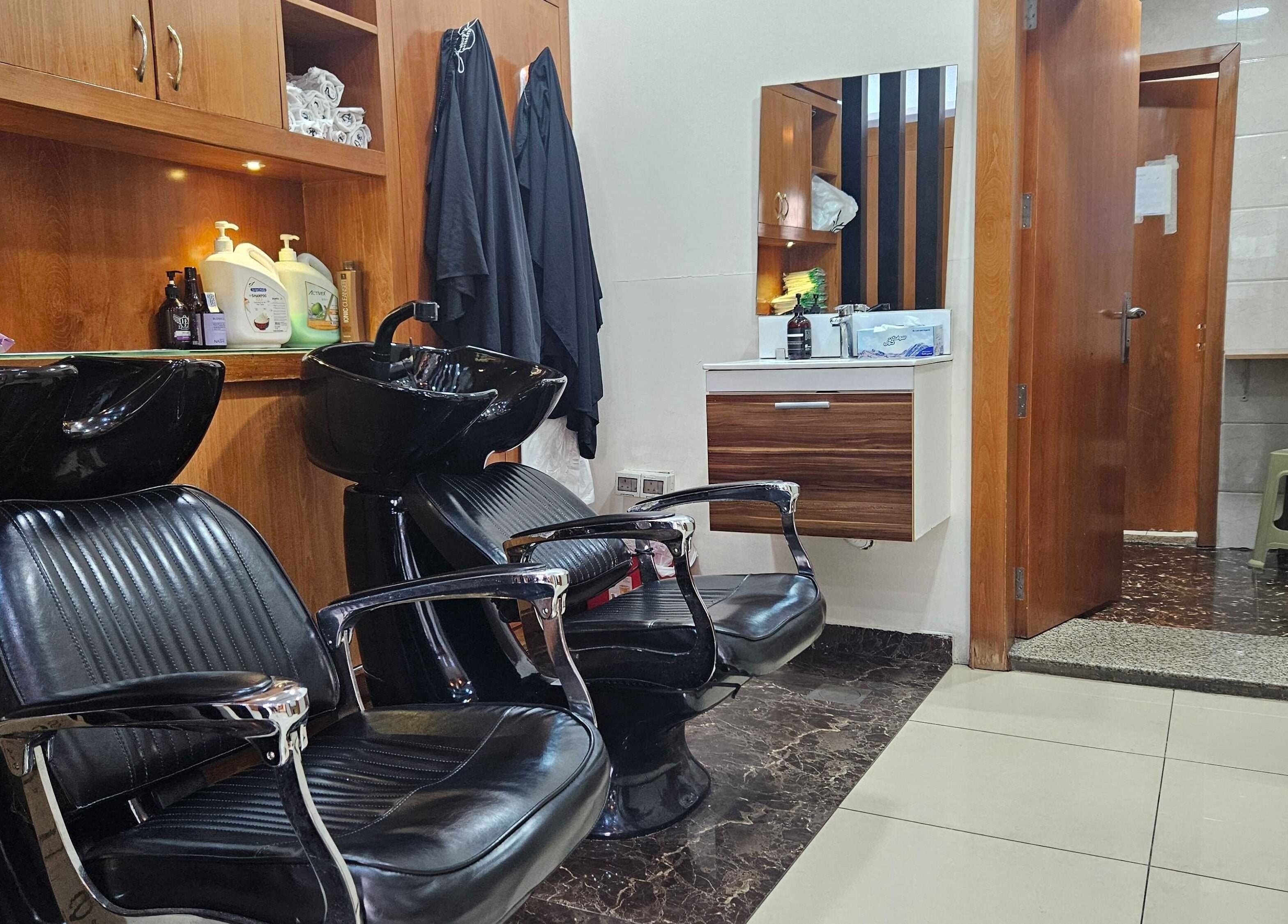 Sleek salon wash stations at Tornado Gents Salon - Marina, Dubai, Dubai, AE enhancing the grooming experience.