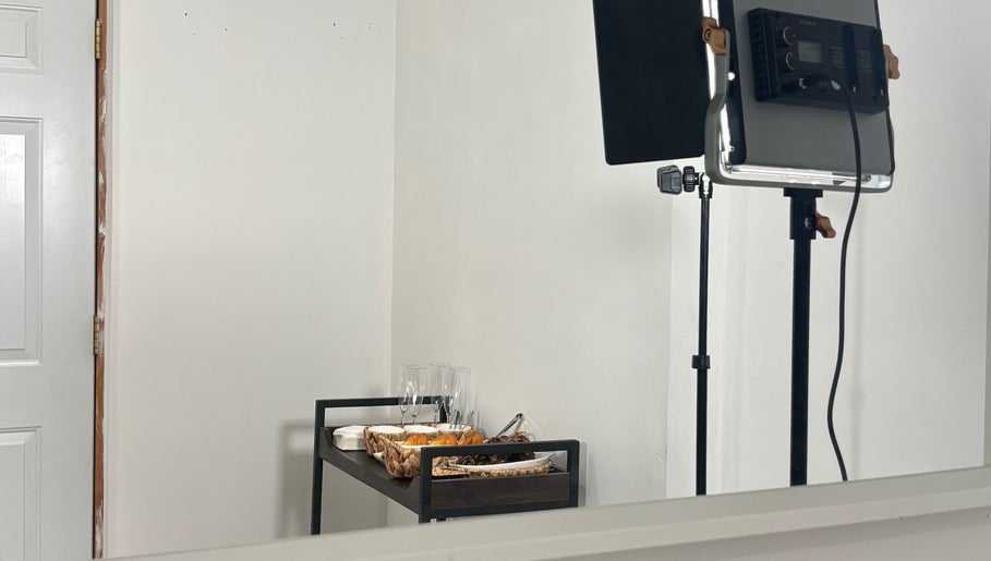 Elegant lighting setup and refreshments at Looks By Syna in Montréal, Québec, CA.