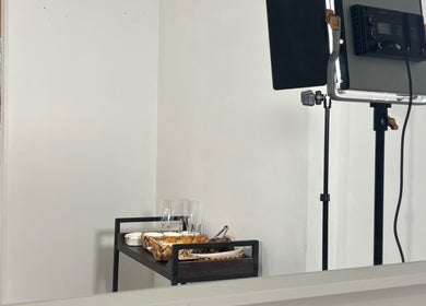 Elegant lighting setup and refreshments at Looks By Syna in Montréal, Québec, CA.