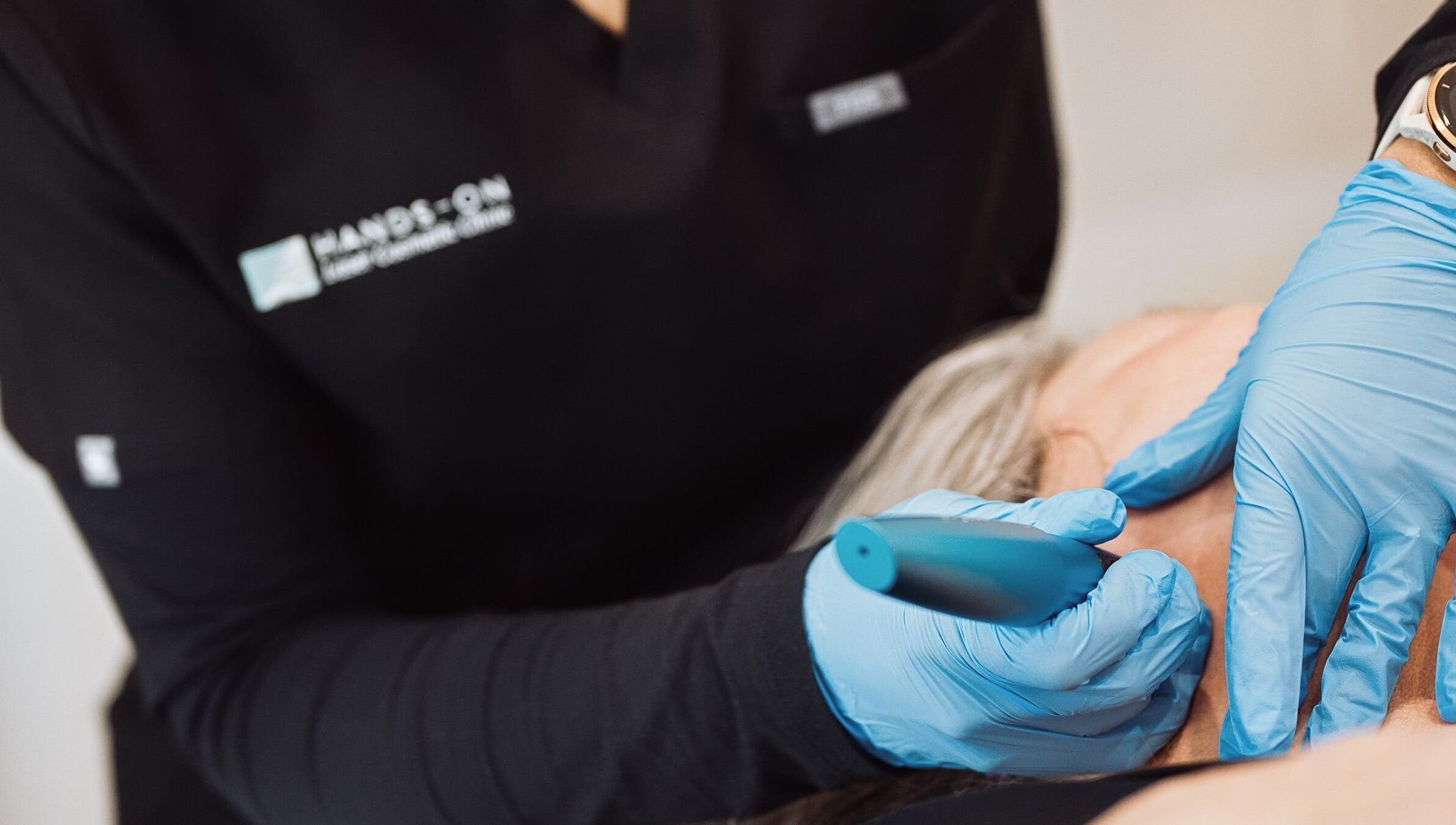 Hands-On Laser Cosmetic Clinic in Melbourne, Victoria, AU, expert performing precise laser treatment.