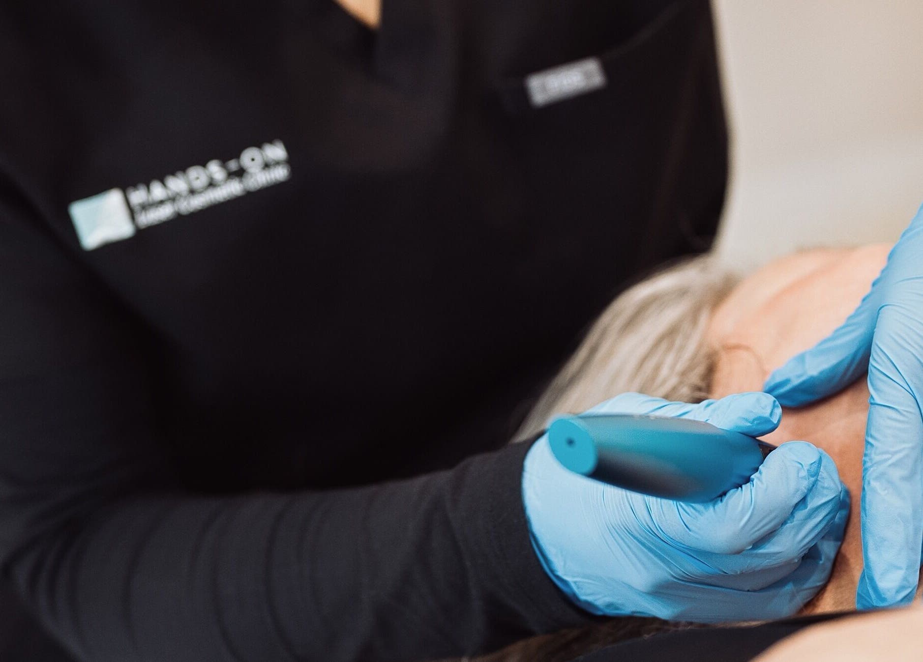 Hands-On Laser Cosmetic Clinic in Melbourne, Victoria, AU, expert performing precise laser treatment.