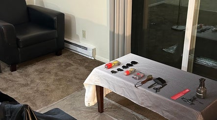 Cozy FT Cuts salon setup with tools in Sylvania, Ohio, US, ready for styling.