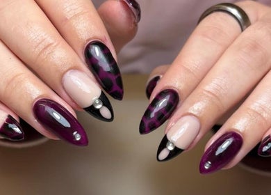 Elegant plum and black nail art with gems by Nails by Jamie Holt, Halfway, England, GB.