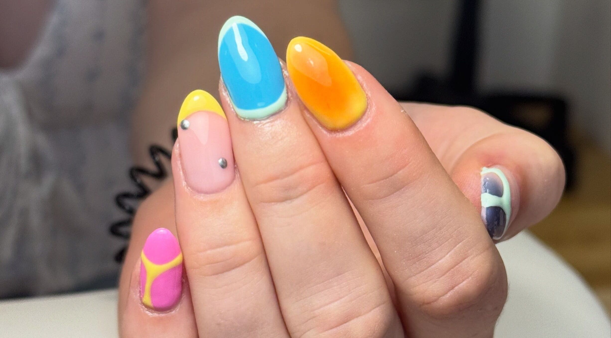 Colorful nail art design at Beauty by Taylor, located in Halfway, England, GB. Perfect for a unique style.