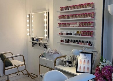 Chic beauty station at Jb_beautyhub_ in Lagos, Lagos, NG showcasing elegant nail polish display.