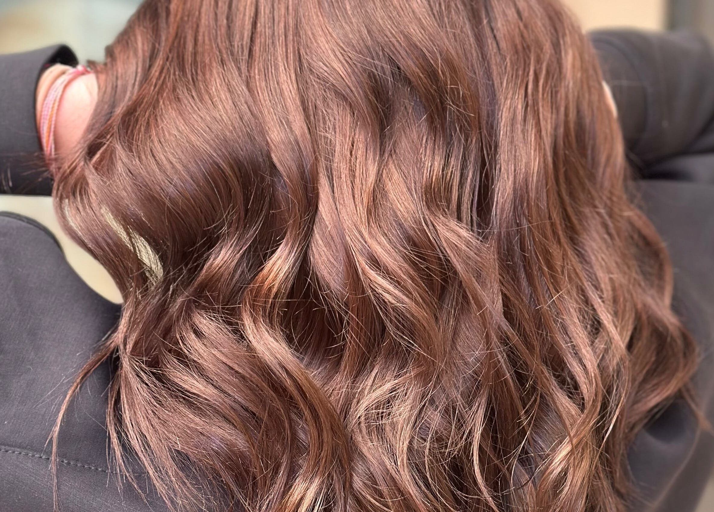 Rich, flowing brown waves styled at Hair By Em, Choudrant, Louisiana, US.