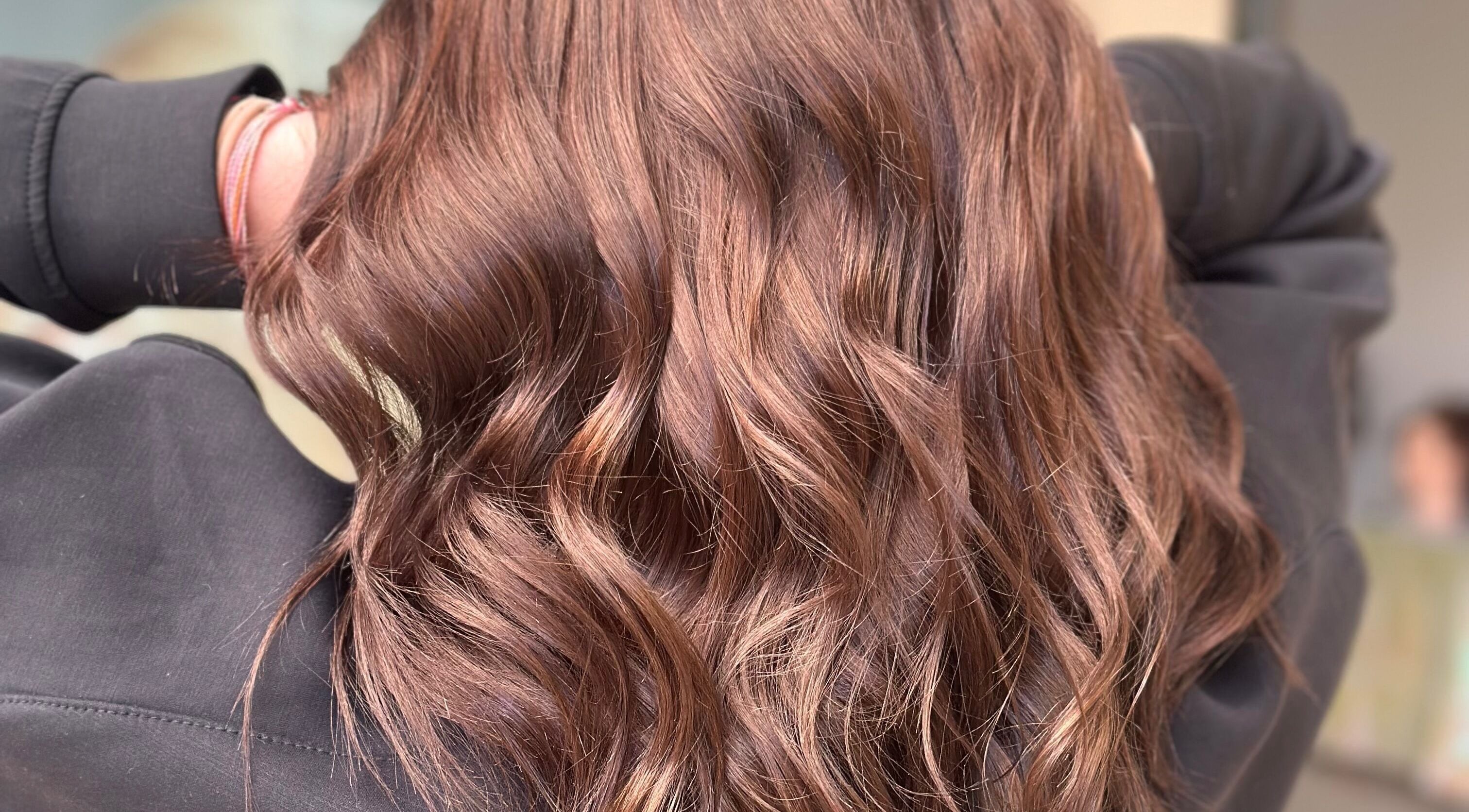 Rich, flowing brown waves styled at Hair By Em, Choudrant, Louisiana, US.