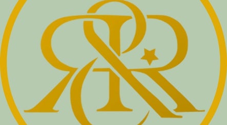 Gold logo of Roots and Rituals on a green background, Mumbai, Maharashtra, IN.