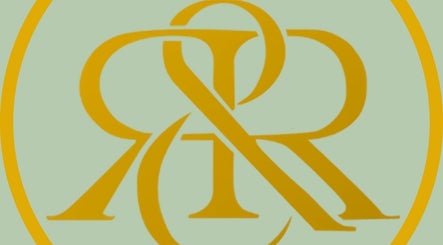 Roots and Rituals logo in gold on green backdrop, Mumbai, Maharashtra, IN.