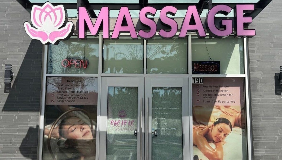 Front view of Pacific Massage & Head Spa in Redmond, Washington, US with welcoming open sign.