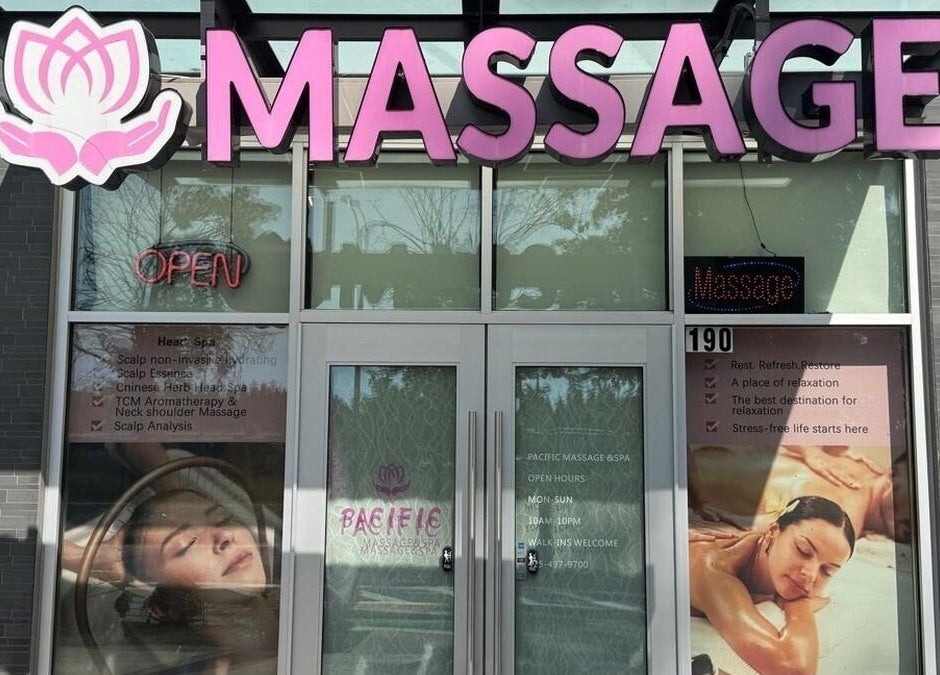 Front view of Pacific Massage & Head Spa in Redmond, Washington, US with welcoming open sign.