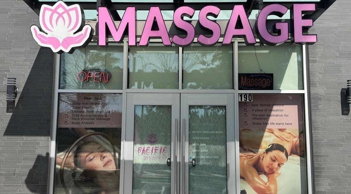 Front view of Pacific Massage & Head Spa in Redmond, Washington, US with welcoming open sign.