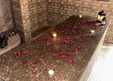 Relaxing spa table with rose petals at Lemon Beauty Bluebells Women Salon, أبو ظبي, أبو ظبي, AE.