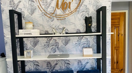 Stylish shelf with decor at Beauty By Moi, Lusaka, Lusaka Province, ZM, showcasing elegance and luxury.