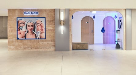 Entrance of Flash Facial Ladies Salon in Dubai, AE, showcasing modern decor and a welcoming ambiance.