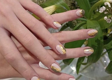 Elegant nail art with gold accents at Glam Guru, Sandton, Gauteng, ZA. Perfect for beauty enthusiasts.