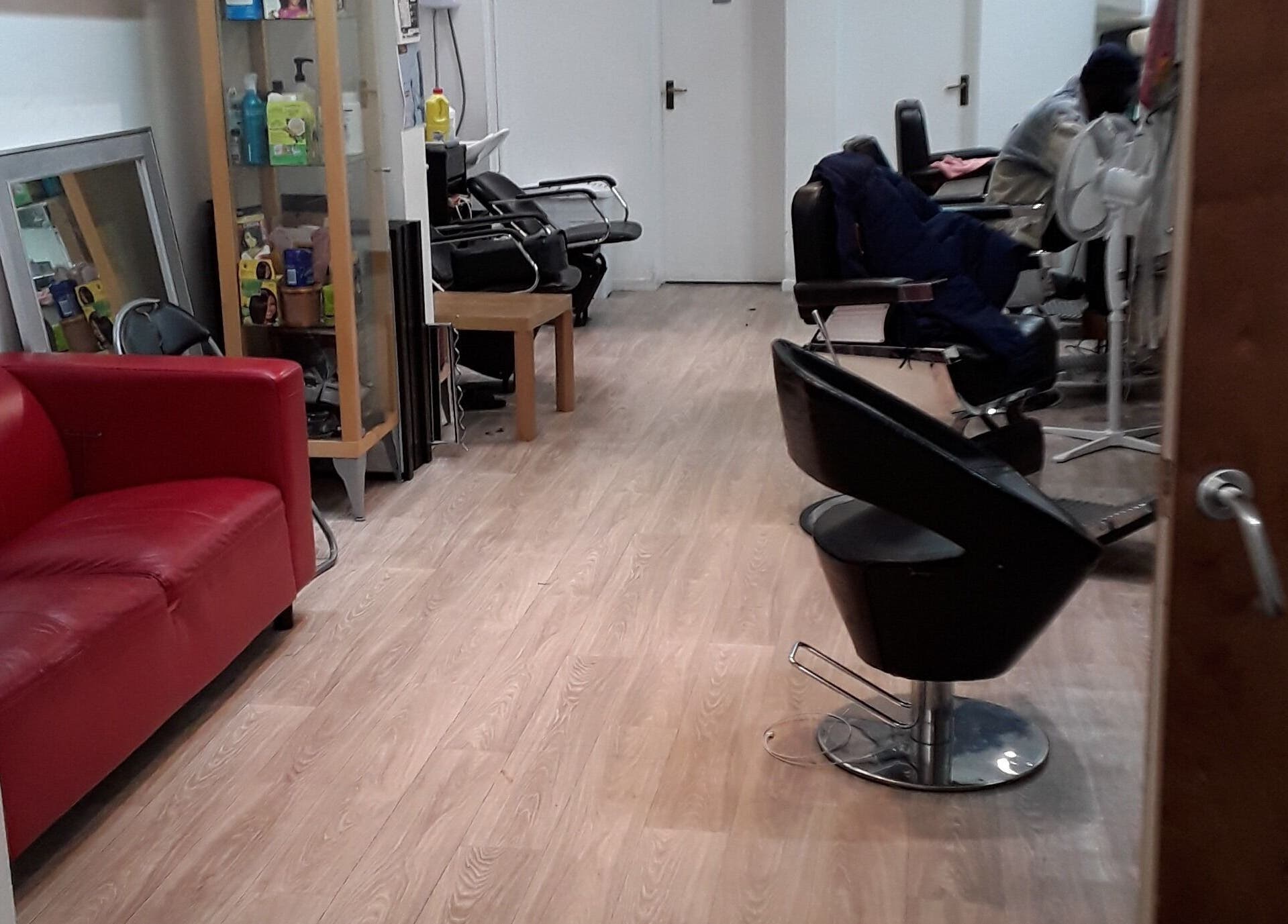Interior of Nu-trendz hair and beauty ltd, Colchester, England, showcasing a modern salon setup.