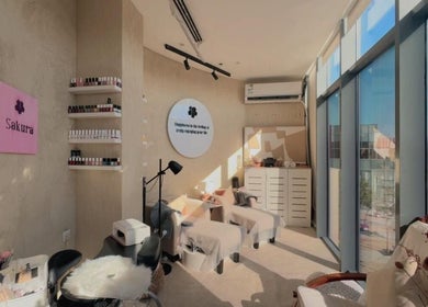 Bright and cozy interior of Sakura Spa in Al Khobar, Eastern Province, SA, featuring relaxing treatment chairs.
