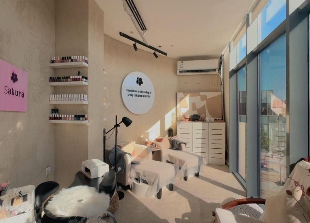 Bright and cozy interior of Sakura Spa in Al Khobar, Eastern Province, SA, featuring relaxing treatment chairs.