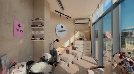 Bright and cozy interior of Sakura Spa in Al Khobar, Eastern Province, SA, featuring relaxing treatment chairs.