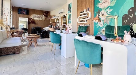 Elegant beauty and wellness salon, Kazachok, Sofia, Sofia City Province, BG with teal seating and floral walls.