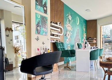 Elegant salon interior at Kazachok, Sofia, Sofia City Province, BG, featuring chic decor and modern styling chairs.