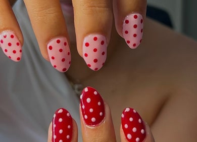 Polka dot nail art at Nails by Han, Cape Town, Western Cape, ZA, showcasing pink and red styles.