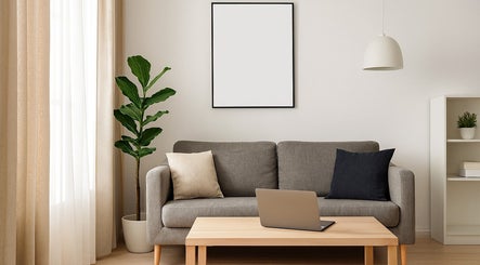 Cozy lounge area at Retha Spa in Johannesburg, Gauteng, ZA featuring modern decor and a welcoming atmosphere.