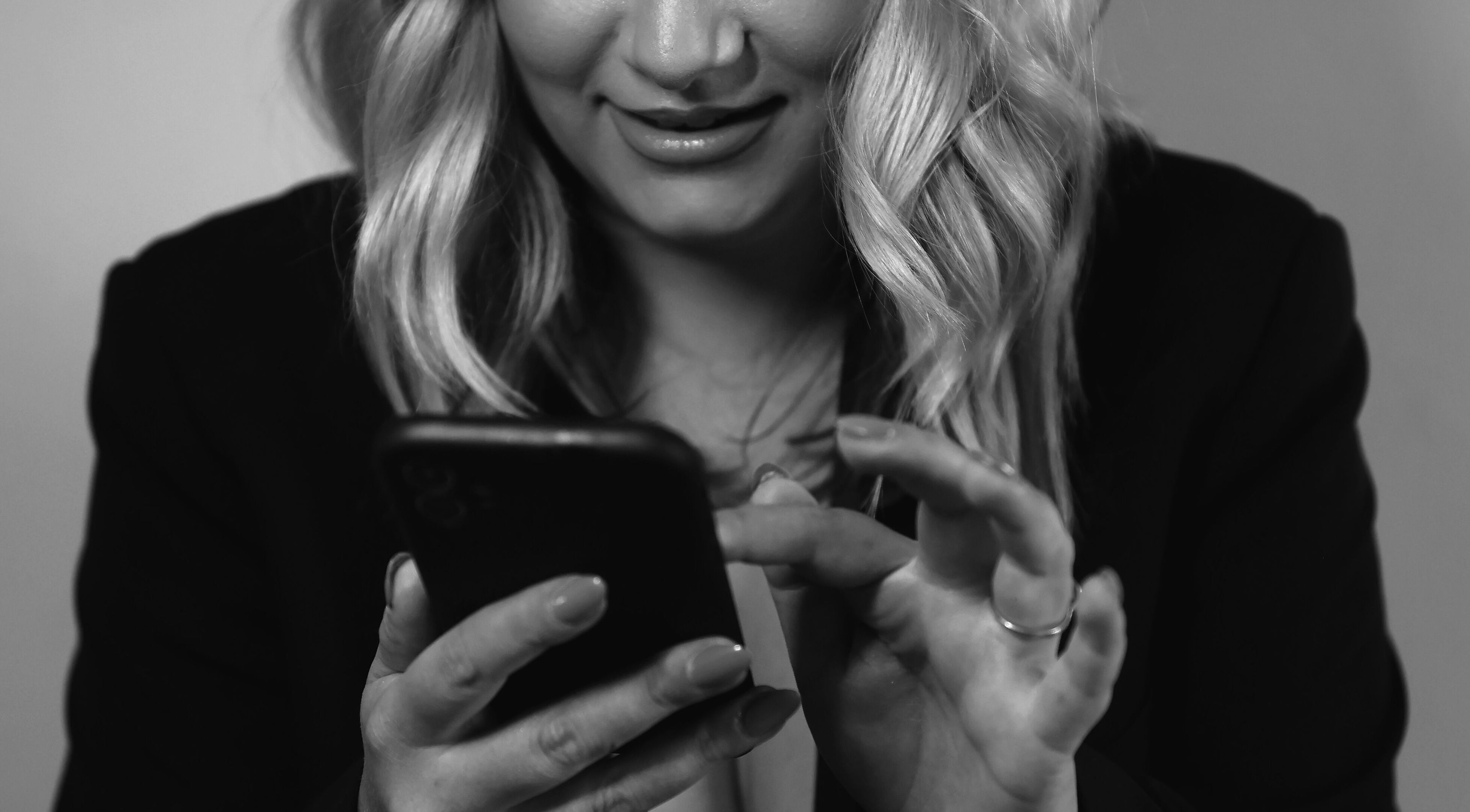 Client scheduling an appointment at Kylie’s Beauty Studio, Cape Town, Western Cape, ZA on mobile phone.