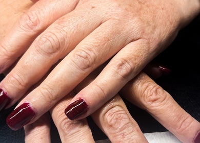 Detailed manicure with crimson polish at Soft Bloom Studio, Springfield Lakes, Queensland, AU.