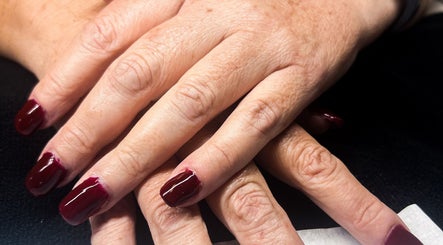 Detailed manicure with crimson polish at Soft Bloom Studio, Springfield Lakes, Queensland, AU.