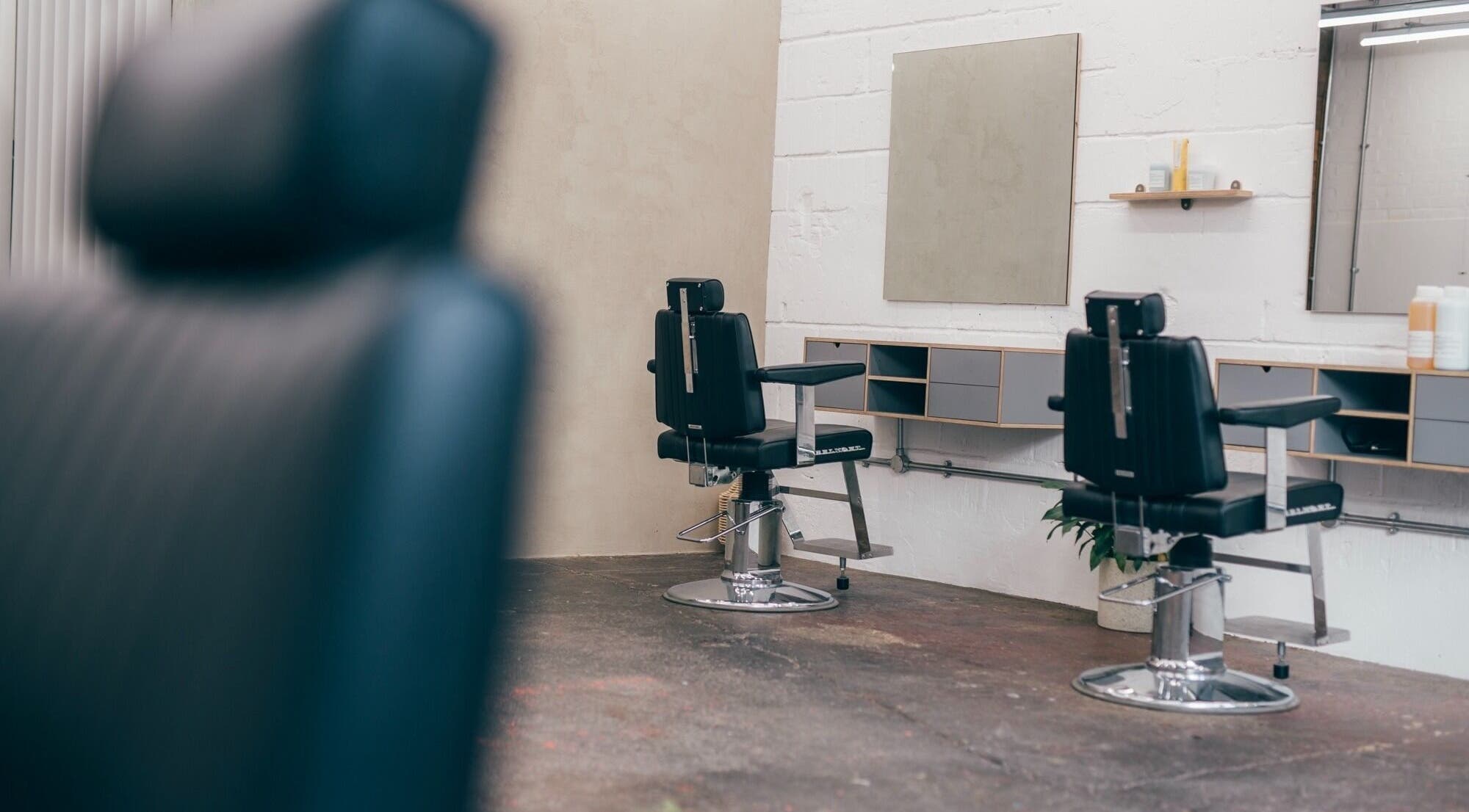 Chic salon chairs and mirrors at Nudo Studio, a beauty venue in London, England, GB.