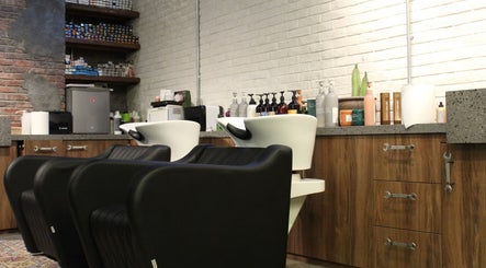 Stylish wash stations at Hair District Barbershop, Dubai, Dubai, AE with modern decor and premium products.