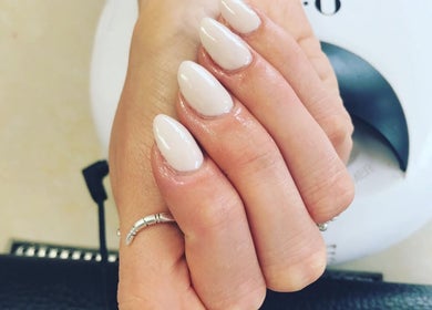 Elegant manicured nails at V-NAILS, Richmond, England, GB, showcasing expert nail artistry.