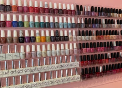 V-NAILS nail polish display in Richmond, England showcases vibrant colors for diverse manicures.