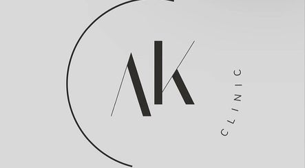 Logo of AK CLINIC in Wolverhampton, England, GB featuring sleek black typography and a modern circular design.