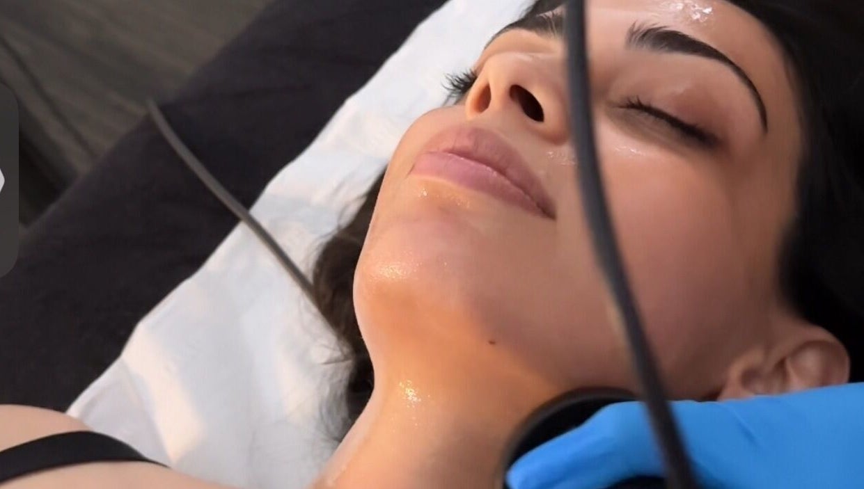 Facial treatment at Ak Clinic, Wolverhampton, England, GB, showcasing relaxation and skincare expertise.