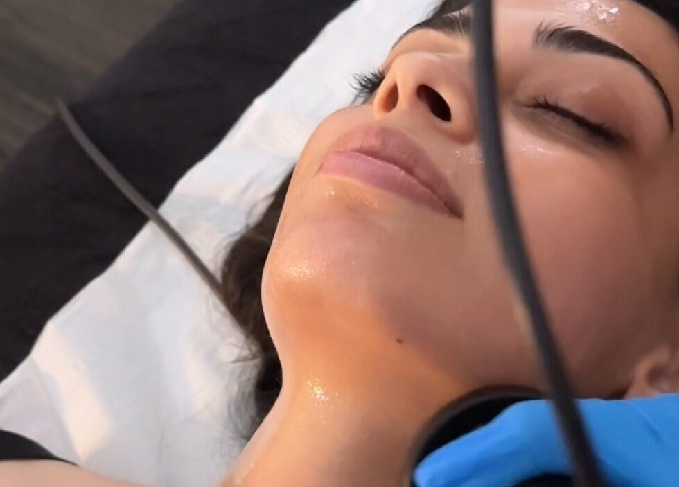 Facial treatment at Ak Clinic, Wolverhampton, England, GB, showcasing relaxation and skincare expertise.