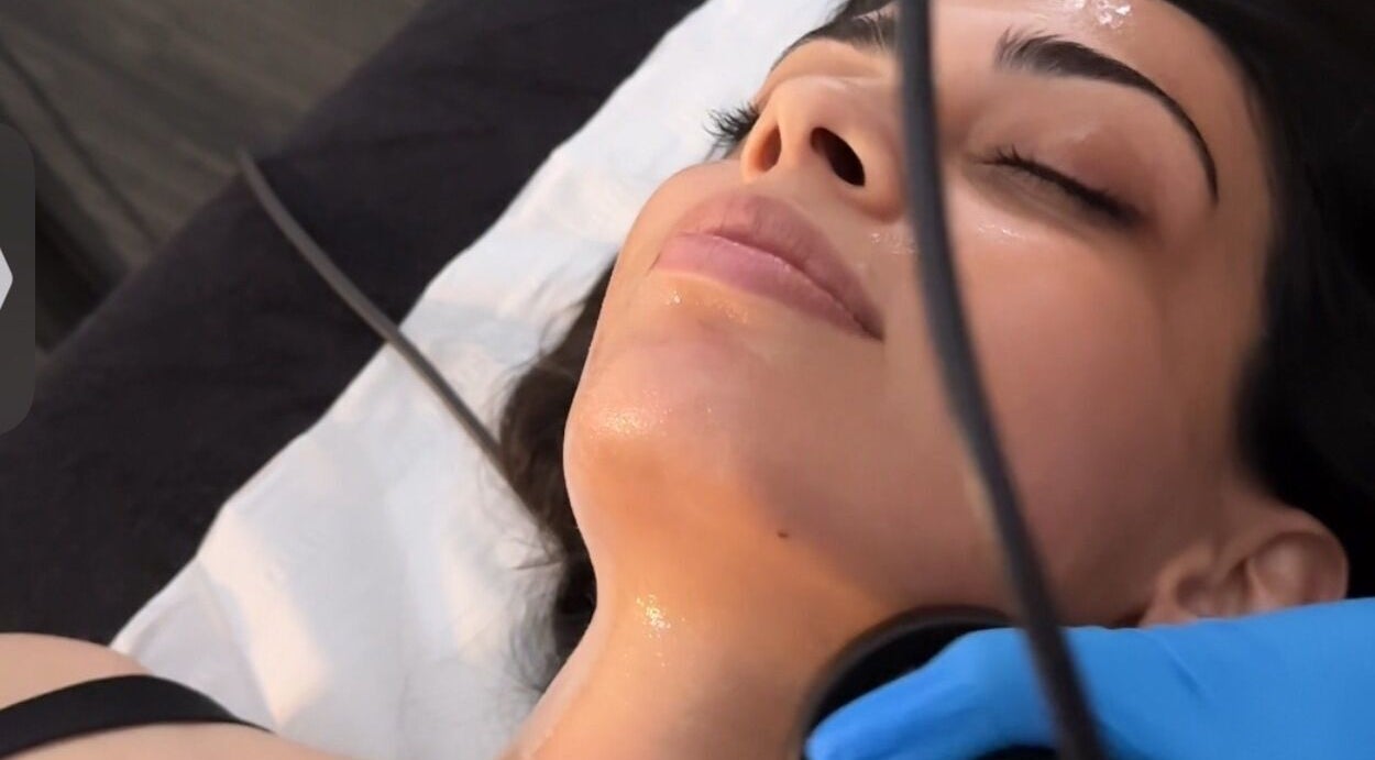 Facial treatment at Ak Clinic, Wolverhampton, England, GB, showcasing relaxation and skincare expertise.