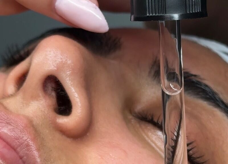 Close-up of facial serum application at Ak Clinic in Wolverhampton, England, GB.